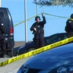 In this image made from Associated Press Television video, police respond at the scene at the U.S. Army base in Fort Hood Texas where a soldier opened fire, unleashing a stream of gunfire that left at least 12 people dead and at least 31 wounded. Authorities killed the gunman, and apprehended two other soldiers suspected in the attack. (AP Photo/APTN)