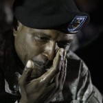 Major William McKnight wipes tears from his 
eyes during a vigil at Fort Hood, Texas, early 
Friday, Nov. 6, 2009. (AP Photo/LM Otero)