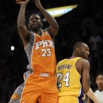 Phoenix Suns guard Jason Richardson (23) shoots behind Los Angeles Lakers guard Kobe Bryant (24) in the first half of a NBA basketball game, Thursday, Nov. 12, 2009, in Los Angeles. (AP Photo/Gus Ruelas)