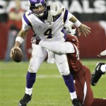 Minnesota Vikings quarterback Brett Favre (4) is sacked by Arizona Cardinals linebacker Karlos Dansby during the second half of an NFL football game Sunday, Dec. 6, 2009 in Glendale, Ariz. The Cardinals won 30-17. (AP Photo/Paul Connors)