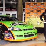 IndyCar driver Danica Patrick unveils her GoDaddy.com No. 7 JR Motorsports stock car during an event announcing her intention to make her stock car racing debut in an ARCA race Tuesday, Dec. 8, 2009, in Phoenix. Patrick has signed with JR Motorsports team, owned by Dale Earnhardt Jr. and Rick Hendrick, and intends to start in her first NASCAR Nationwide Series race on Feb. 6 at Daytona International Speedway. (AP Photo/Ross D. Franklin)