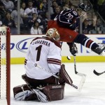 Columbus Blue Jackets' Antoine Vermette, right, tries to redirect the puck as Phoenix Coyotes' Jason LaBarbera makes a save during the second period of an NHL hockey game Thursday, Dec. 17, 2009, in Columbus, Ohio. (AP Photo/Jay LaPrete)