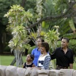 President Barack Obama, Michelle Obama, Malia Obama 11, and Sasha Obama, 8, left, look at the animals as they walk through the Honolulu Zoo in Honolulu, Hawaii Sunday, Jan. 3, 2010. The Obamas are in Hawaii for the holidays, and will be leaving later today. (AP Photo/Alex Brandon)