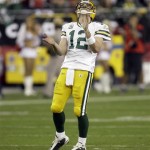 Green Bay Packers quarterback Aaron Rodgers reacts to an incomplete pass during the second half of an NFL wild-card playoff football game against the Arizona Cardinals on Sunday, Jan. 10, 2010, in Glendale, Ariz. (AP Photo/Paul Connors)