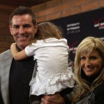 Kurt Warner's family joined him after he announced his retirement Friday, January 29, at the team's Tempe headquarters. (Adam Green/KTAR)