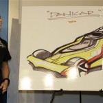 In this photograph taken by AP Images for Hot Wheels, Danica Patrick unveiled a sketch of the Hot Wheels "Danicar" during a press conference, at the Daytona International Speedway, announcing Hot Wheels return to NASCAR through a partnership with JR Motorsports in Daytona Beach, Fla., Saturday, February 6, 2010. (Julie Fletcher/AP Images for Hot Wheels)