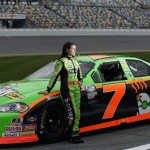 Driver Danica Patrick poses by her car after her qualifying attempt for the Lucas Oil Slick Mist 200 ARCA auto race at the Daytona International Speedway in Daytona Beach, Fla., Friday, Feb. 5, 2010. (AP Photo/Dave Martin)