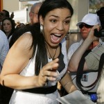 May 11: Jordin Sparks, 17, from Glendale, Ariz. and one of three finalists for "American Idol," waves to some of her fans as she arrived to perform at Westgate City Center in her hometown of Glendale, Ariz. Thousands of fans came out in over 100-degree heat to watch her sing. (AP Photo/Ross D. Franklin)