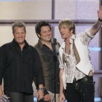 Rascal Flatts, from left, Gary LeVox, Jay DeMarcus and Joe Don Rooney accept the award for top vocal group during the 42nd Annual Academy of Country Music Awards on Tuesday, May 15, 2007, in Las Vegas. (AP Photo/Mark J. Terrill)