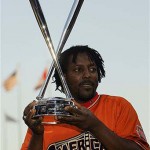 Los Angeles Angels' Vladimir Guerrero holds up the trophy after winning the All-Star Home Run Baseball Derby in San Francisco on Monday. AP Photo/Jeff Chiu