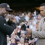 American League's Alex Rodriguez compares grips with National League's Barry Bonds during the All-Star Home Run Baseball Derby in San Francisco. AP Photo/Jeff Chiu