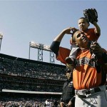 American League's Victor Martinez carries his two-year-old son Jose Victor on his shoulders during the All-Star Home Run Baseball Derby. AP Photo/Eric Risberg