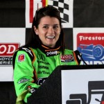 IRL driver Danica Patrick talks with the media during Indy testing at the Barbers Motorsports Park on Wednesday, Feb. 24, 2010, in Birmingham, Ala. (AP Photo/Butch Dill)