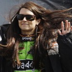 NASCAR driver Danica Patrick waves to fans during driver introductions before the start of the DRIVE4COPD 300 Nationwide auto race at Daytona International Speedway in Daytona Beach, Fla., Saturday, Feb. 13, 2010.(AP Photo/John Raoux)