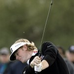 Third-round leader Brandt Snedeker hits his tee shot on the par-three fourth hole during the final round of the Phoenix Open PGA golf tournament Sunday, Feb. 28, 2010, in Scottsdale, Ariz. (AP Photo/Paul Connors)