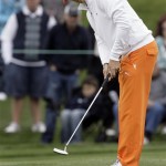 Rickie Fowler watches as his putt for birdie stops just shy on the second hole during the final round of the Phoenix Open PGA golf tournament Sunday, Feb. 28, 2010, in Scottsdale, Ariz. Fowler made par on the hole. (AP Photo/Paul Connors)