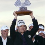 Phoenix Open champion Hunter Mahan holds the winner's trophy after the final round of the Phoenix Open PGA golf tournament Sunday, Feb. 28, 2010, in Scottsdale, Ariz. Mahan finished the tournament at 16-under par, one stroke ahead of Rickie Fowler. (AP Photo/Jason Babyak)
