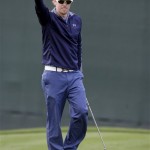 Hunter Mahan points to fans after making a putt for birdie on the 16th hole during the final round of the Phoenix Open PGA golf tournament Sunday, Feb. 28, 2010, in Scottsdale, Ariz. Mahan won with a final score 16-under 268. (AP Photo/Paul Connors)