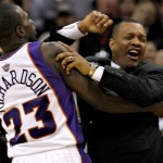 Phoenix Suns' Jason Richardson (23) holds back head coach Alvin Gentry during the second half of an NBA basketball game Los Angeles Lakers Friday, March 12, 2010, in Phoenix. Gentry was ejected from the game. The Lakers won 102-96. (AP Photo/Matt York)