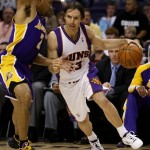 Phoenix Suns guard Steve Nash, right, drives the baseline against Los Angeles Lakers guard Derek Fisher during the second half of an NBA basketball game Friday, March 12, 2010, in Phoenix. The Lakers won 102-96. (AP Photo/Matt York)