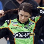Driver Danica Patrick (7) removes her hair band after qualifying for the NASCAR Nationwide Series Sam's Town 300 auto race Saturday, Feb. 27, 2010 in Las Vegas. (AP Photo/Isaac Brekken)