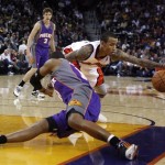 Monta Ellis of the Golden State Warriors grabs a loose ball from Phoenix Suns' Leandro Barbosa during the first half of an NBA basketball game Monday, March 22, 2010, in Oakland, Calif. (AP Photo/San Francisco Chronicle, Carlos Avila Gonzalez)