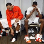 Syracuse's Kris Joseph, left, and Mookie Jones sit in the locker room after losing to Butler in an NCAA West Regional semifinal college basketball game in Salt Lake City, Thursday, March 25, 2010. Butler won 63-59. (AP Photo/Paul Sakuma)