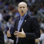Xavier head coach Chris Mack calls to his team in the first half of an NCAA West Regional semifinal college basketball game against Kansas State in Salt Lake City, Thursday, March 25, 2010. (AP Photo/Colin E. Braley)