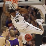 Michigan State's Delvon Roe (10) dunks in front of Northern Iowa's Jordan Eglseder (53) during the second half of an NCAA Midwest Regional college basketball game Friday, March 26, 2010, in St. Louis. (AP Photo/Paul Sancya)