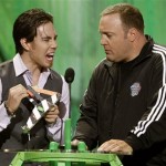 Host Kevin James, right, and Apolo Anton Ohno are seen on stage at Nickelodeon's 23rd Annual Kids' Choice Awards on Saturday, March 27, 2010, in Los Angeles. (AP Photo/Matt Sayles)