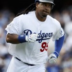 Los Angeles Dodgers' Manny Ramirez runs out his first home run of the season against the Arizona Diamondbacks in the fourth inning of the Dodgers' home opener baseball game Tuesday, April 13, 2010 in Los Angeles. Ramirez, Andre Ethier, Casey Blake and Matt Kemp all homered as the Dodgers won, 9-5. (AP Photo/Reed Saxon)