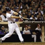 San Diego Padres' Nick Hundley connects for a single during the seventh inning of a baseball game against the Arizona Diamondbacks Saturday, April 17, 2010 in San Diego. The Padres won 5-0. (AP Photo/Denis Poroy)