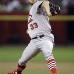 St. Louis Cardinals' Brad Penny winds up to deliver a pitch against the Arizona Diamondbacks in the second inning of a baseball game Monday, April 19, 2010, in Phoenix. (AP Photo/Paul Connors)