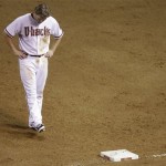 Arizona Diamondbacks' Mark Reynolds kicks at the infield dirt in frustration after being stranded on first base against the St. Louis Cadinals in the eighth inning of a baseball game Monday, April 19, 2010, in Phoenix. (AP Photo/Paul Connors)