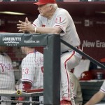Philadelphia Phillies manager Charlie Manuel watches the action against the Arizona Diamondbacks in the second inning of a baseball game Saturday, April 24, 2010, in Phoenix. (AP Photo/Paul Connors)