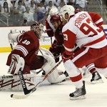 Phoenix Coyotes goalie Ilya Bryzgalov (30) stops a shot by Detroit Red Wings center Johan Franzen during the first period of Game 7 of an NHL first-round playoff hockey series Tuesday, April 27, 2010 in Glendale, Ariz. (AP Photo/Ross D. Franklin)