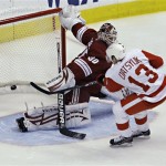 Detroit Red Wings center Pavel Datsyuk (13) scores past Phoenix Coyotes goalie Ilya Bryzgalov during the second period of Game 7 of an NHL first-round playoff hockey series Tuesday, April 27, 2010, in Glendale, Ariz. (AP Photo/Ross D. Franklin)