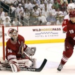 Phoenix Coyotes' Ilya Bryzgalov (30), of Russia, makes a save on a shot as Coyotes' Sami Lepisto (18), of Finland, and Detroit Red Wings' Daniel Cleary looks on during the first period in Game 7 of a first-round NHL playoff hockey series Tuesday, April 27, 2010, in Glendale, Ariz. (AP Photo/Ross D. Franklin)
