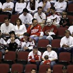 Phoenix Coyotes' fans watch the final seconds against the Detroit Red Wings during the first period of Game 7 of an NHL first-round playoff hockey series Tuesday, April 27, 2010 in Glendale, Ariz. The Red Wings won 6-1 to advance to the second round. (AP Photo/Matt York)