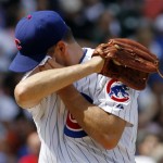 Chicago Cubs starter Ted Lilly wipes his face Arizona during the fourth inning of a baseball game against the Diamondbacks Thursday, April 29, 2010, in Chicago.(AP Photo/Nam Y. Huh)
