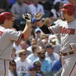 Arizona Diamondbacks' Chris Snyder, right, celebrates with Ian Kennedy after hitting a two-run home run against the Chicago Cubs during the fourth inning of a baseball game Thursday, April 29, 2010, in Chicago.(AP Photo/Nam Y. Huh)
 