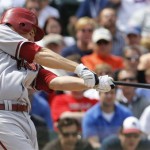 Arizona Diamondbacks' Adam LaRoche hits a three-run homer against the Chicago Cubs during the fourth inning of a baseball game Thursday, April 29, 2010, in Chicago.(AP Photo/Nam Y. Huh)
