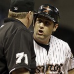 Houston Astros' Lance Berkman, right, argues with home plate umpire Brian Runge (71) after striking out against the Arizona Diamondbacks during the eighth inning of a baseball game Tuesday, May 4, 2010 in Houston. (AP Photo/David J. Phillip)