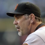 San Francisco Giants manager Bruce Bochy watches during the first inning of the Giants' baseball game against the Arizona Diamondbacks on Wednesday, May 19, 2010, in Phoenix. (AP Photo/Paul Connors)