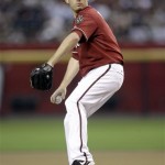Arizona Diamondbacks' Ian Kennedy winds up to deliver a pitch against the San Francisco Giants in the third inning of a baseball game Wednesday, May 19, 2010, in Phoenix. (AP Photo/Paul Connors)