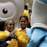The Olympic mascot Wenlock, left, and the Paralympic mascot Mandeville play with school children as they are unveiled to the media as the mascots for London 2012, at a school in London, Wednesday, May 19, 2010. The theme of the two mascots is that they were created from the last drops of steel left over from the construction of the final support girder for the Olympic Stadium. (AP Photo/Matt Dunham)
