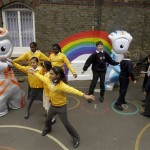 The Olympic mascot Wenlock, left, and the Paralympic mascot Mandeville play with school children as they are unveiled to the media as the mascots for London 2012, at a school in London, Wednesday, May 19, 2010. (AP Photo/Matt Dunham)
 