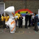 The Chairman of LOCOG the London organising committee for the Olympic Games Sebastian Coe, left, stands with Olympic mascot Wenlock, left mascot, and the Paralympic mascot Mandeville as they stand with school children whilst being unveiled to the media as the mascots for London 2012 at a school in London, Wednesday, May 19, 2010. (AP Photo/Matt Dunham)
