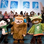 In this Nov. 27, 2007, file photo, the mascots for the Vancouver 2010 Winter Olympics, from left, Miga, Quatchi and Sumi pose for photographers following their debut to students in Surrey, British Columbia. (AP Photo/The Canadian Press, Jonathan Hayward, File)
