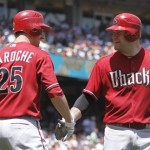 Arizona Diamondbacks' Adam LaRoche, left, and Chris Snyder celebrate scoring after Snyder's two-run home run off San Francisco Giants' Todd Wellemeyer during the second inning of a baseball game Sunday, May 30, 2010, in San Francisco. (AP Photo/Ben Margot)